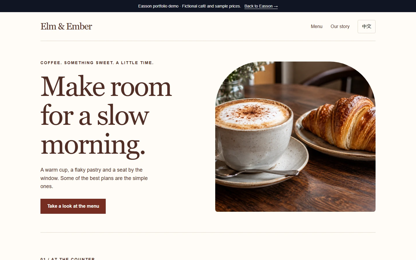 Actual Elm and Ember café website screenshot with its original warm colours